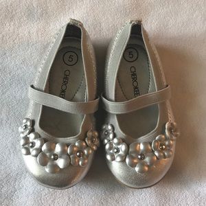 Silver shoes with flower detail. Size 5 baby.